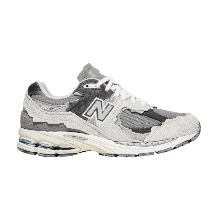 נעלי ניו באלאנס בצבע לבן אפור - New Balance 2002R נעלי ניו באלאנס בצבע לבן אפור